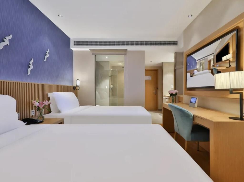Habitación triple familiar, vista a la ciudad | Wifi gratis 