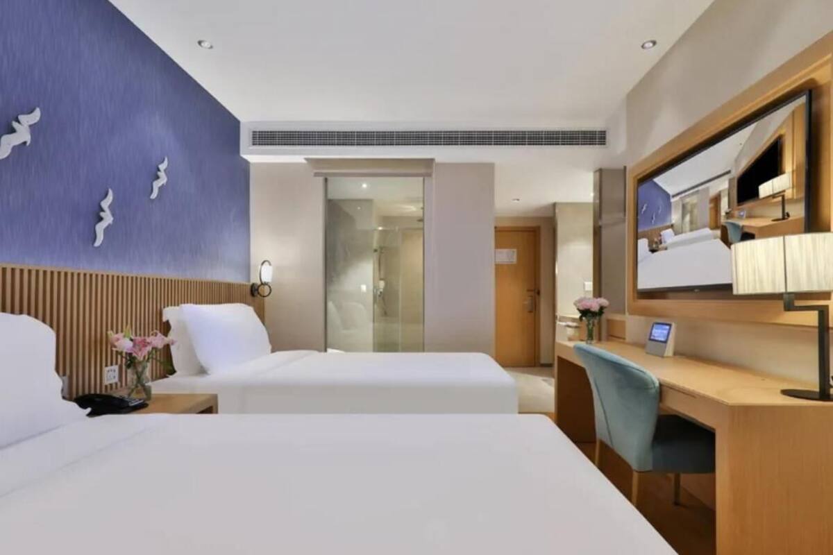 Chambre Triple Familiale, vue ville | Wi-Fi gratuit
