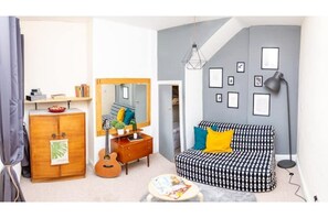 Smart TV, fireplace, books