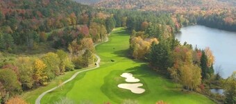 Spacious Ski Lodge in Killington with Game Room and Wood burning Fireplace.