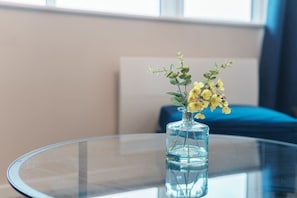 Fresh flowers adorn a stylish table setting.