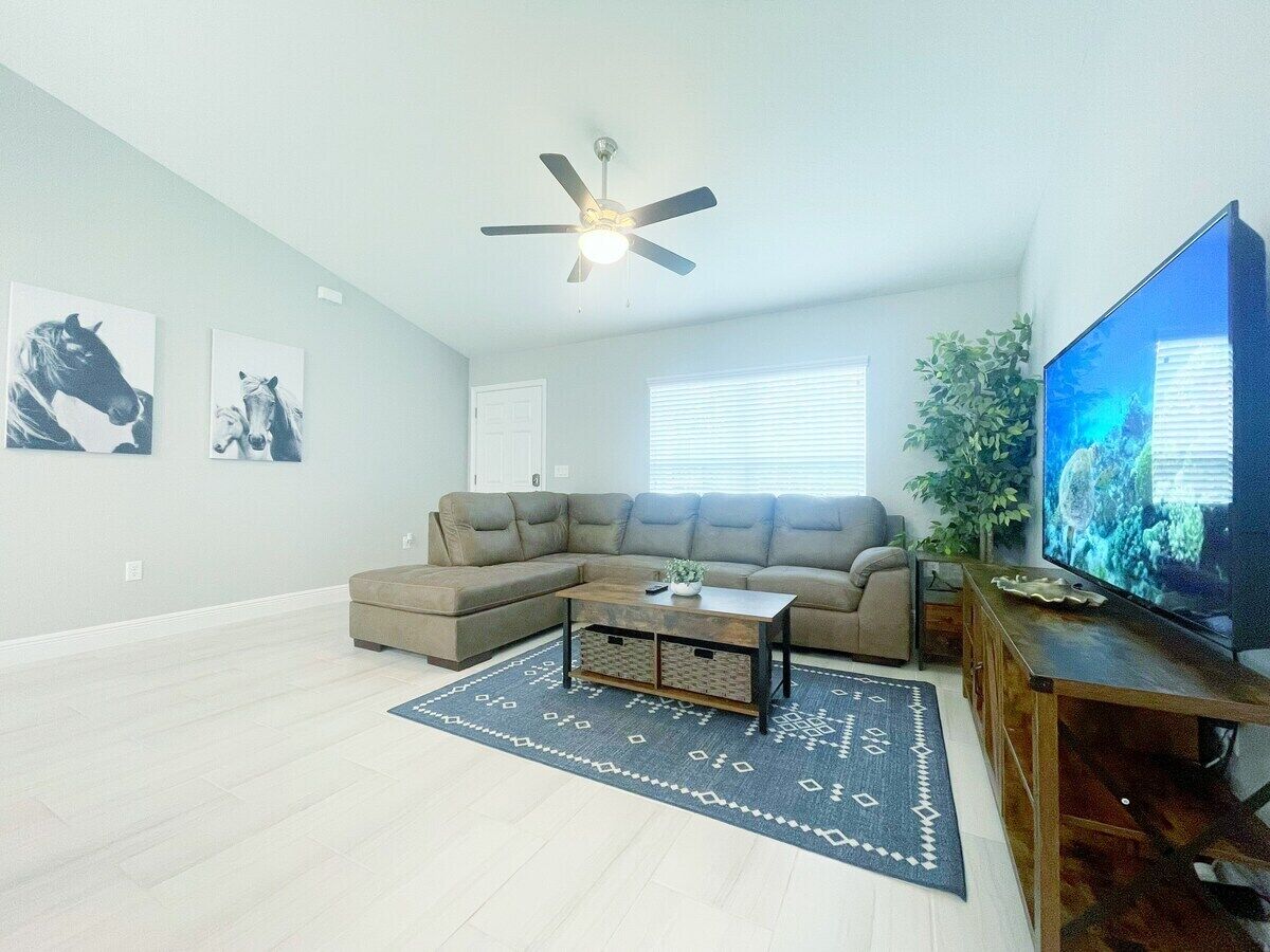 Comfy and Cozy 4 bedroom home with garage