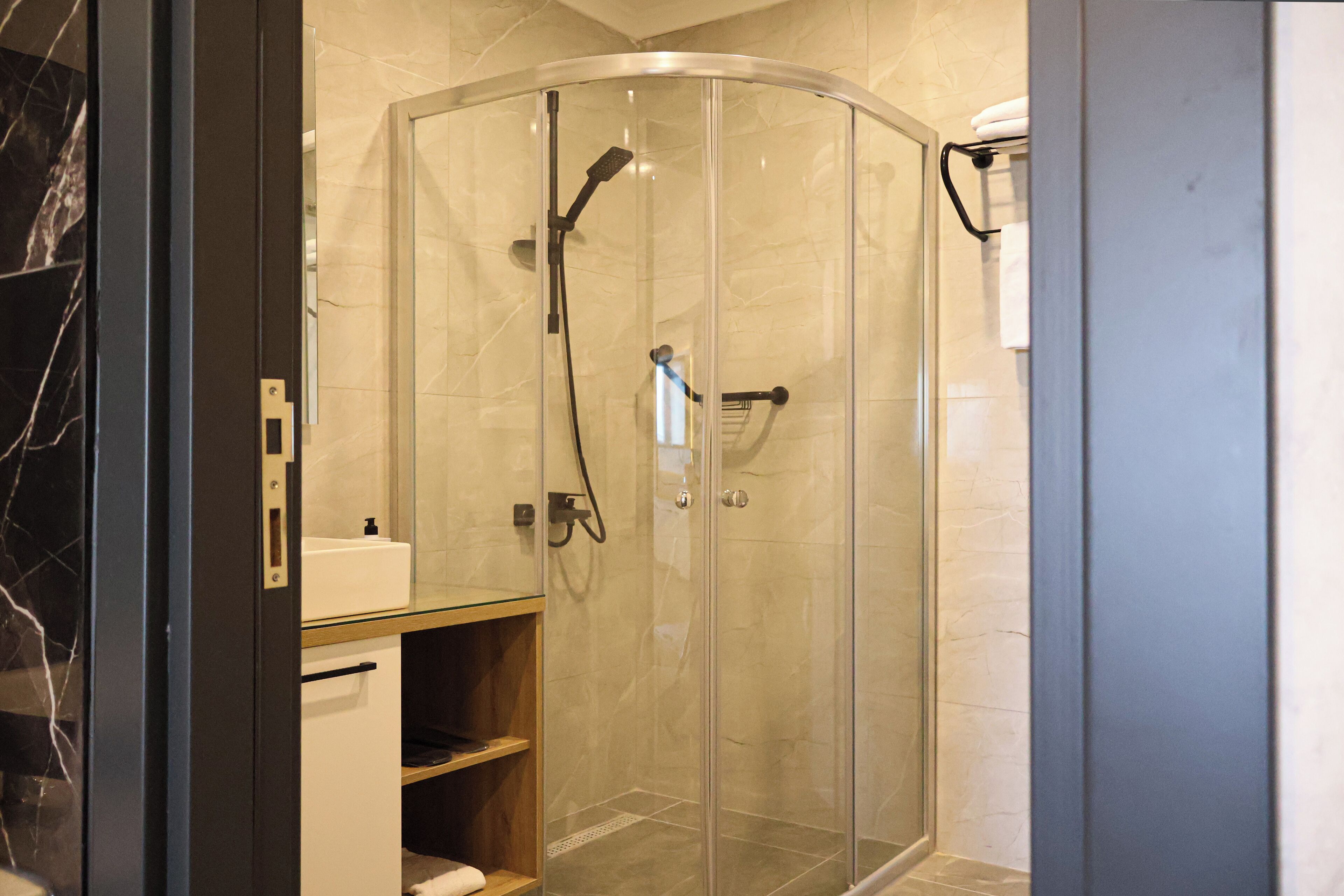 luxury room | bathroom | shower, rainfall showerhead, free toiletries, hair dryer