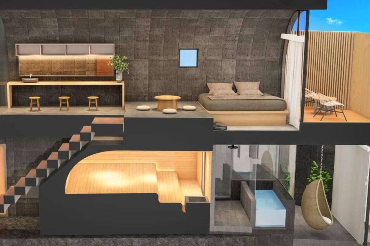 A modern interior with a kitchen, dining area, and bedroom.