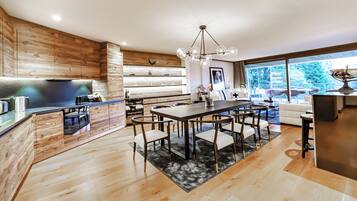 Premium Apartment, 3 Bedrooms | Living area | 166-cm Smart TV with digital channels, TV, books