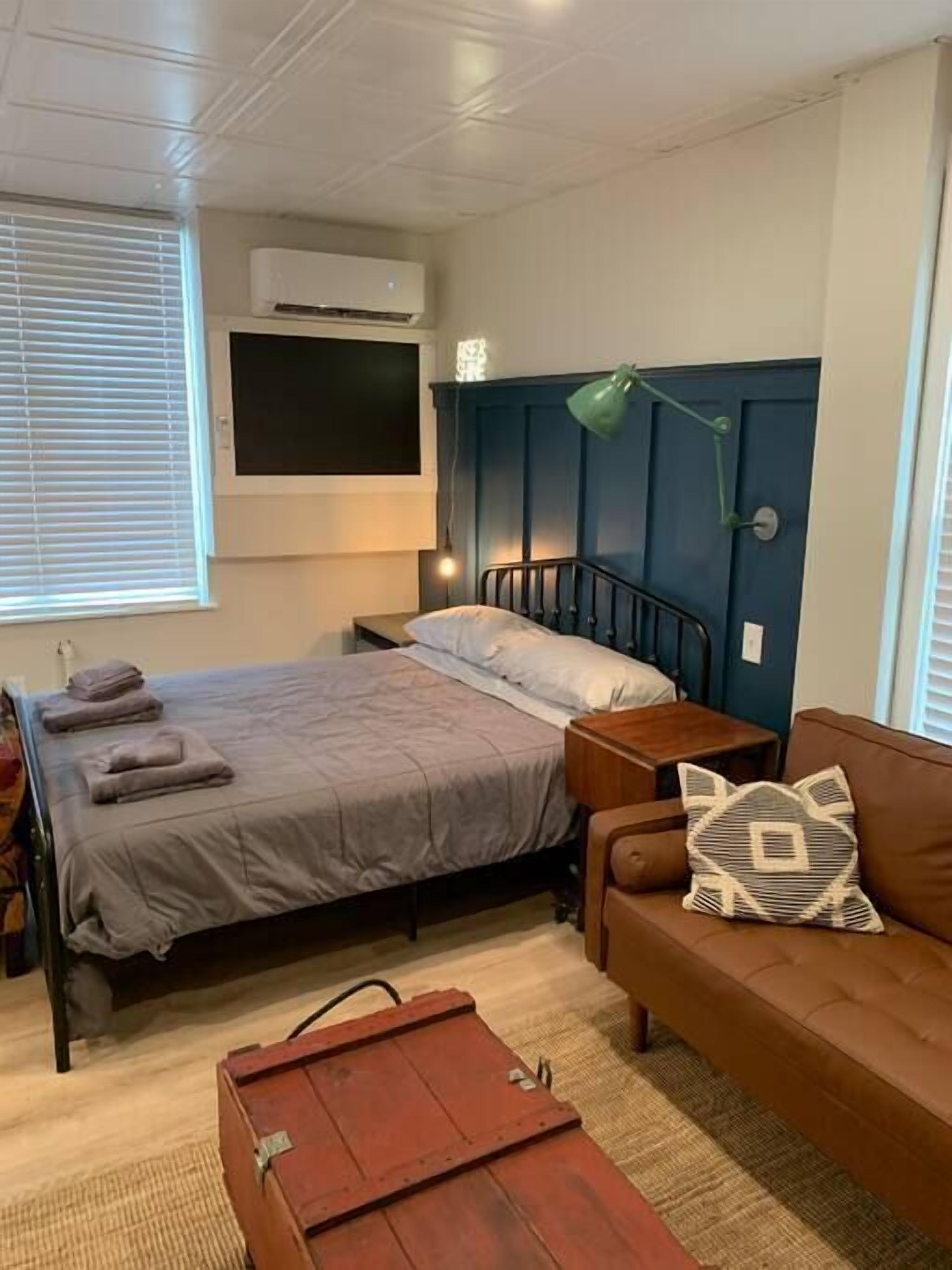 1 bedroom, desk, laptop workspace, iron/ironing board