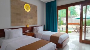 A hotel room with two beds, a wooden headboard, a wall-mounted light, and a view of the outdoors through a glass door. - De Padma Villa Gili Air (Gili Air)