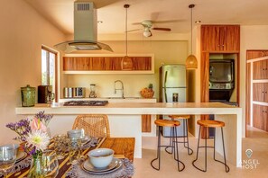 Fridge, microwave, stovetop, coffee/tea maker