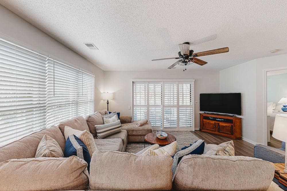 Coastal resort condo with on-site pools, hot tub, game room, & golf