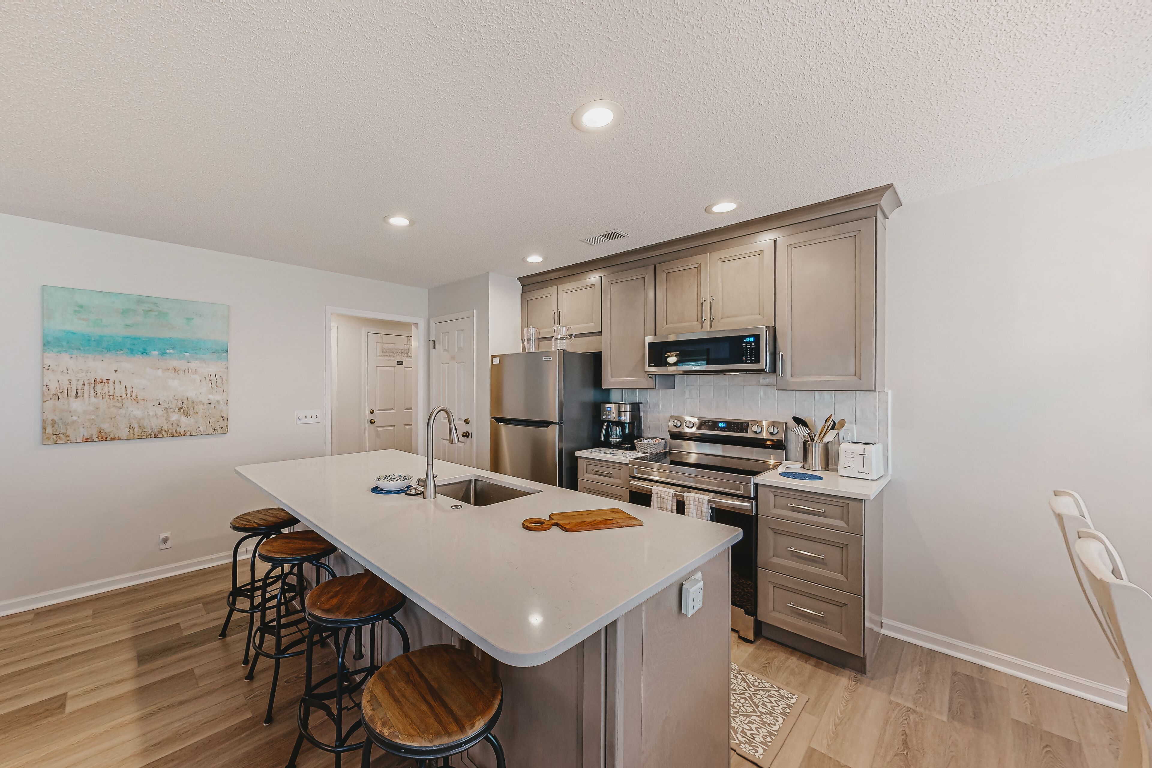 Coastal resort condo with on-site pools, hot tub, game room, & golf