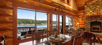 Waterfront cabin with bikes, expansive deck, grill, firepit, W/D, & theater room