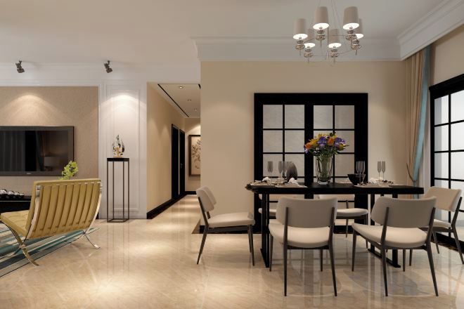 A modern dining area with a table set for four, surrounded by chairs, a vase with flowers, and a large window with blinds.