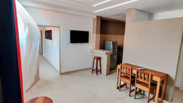 Family Apartment | Living area | 32-inch LED TV with cable channels, TV