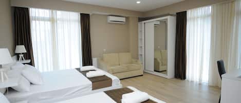 Premium bedding, iron/ironing board, free WiFi, bed sheets