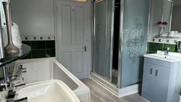 Family Triple Room | Bathroom | Hair dryer, towels, soap, toilet paper