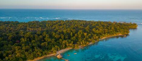 On the beach, sun-loungers, beach towels, snorkelling