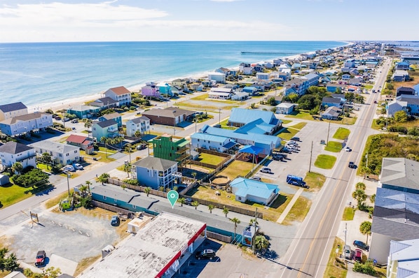 An aerial view of a coastal residential area with houses, a pier, and a beach. - Key West 1- Beach Access - Dog Friendly - Grill (Surf City)