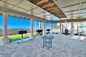 Outdoor dining - The Oasis 2505 | Spacious, Lazy River, Poolside Grill, New Splash Pad, Pool with Slide! (Orange Beach)