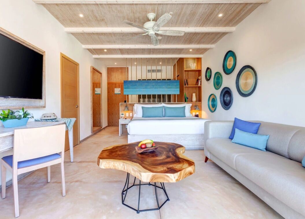 Stretch out in the airy studio-style room after beach days.