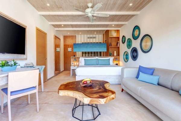 Stretch out in the airy studio-style room after beach days.