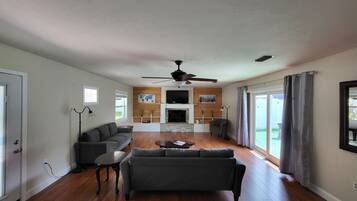 Smart TV, fireplace, books, video library