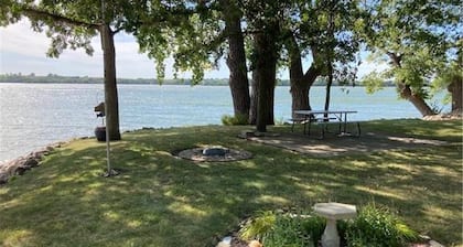 Year round cabin on level lot with dock