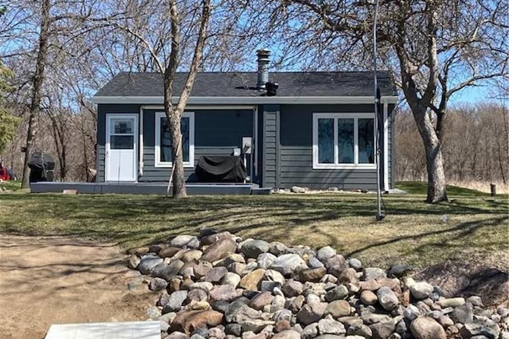 Year round cabin on level lot with dock