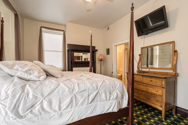 Our Titlow Room features a high Victorian bed. Location 2nd floor, front