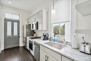 Fridge, microwave, oven, stovetop - The Magnolia Suite at 265 Rutledge (Charleston)
