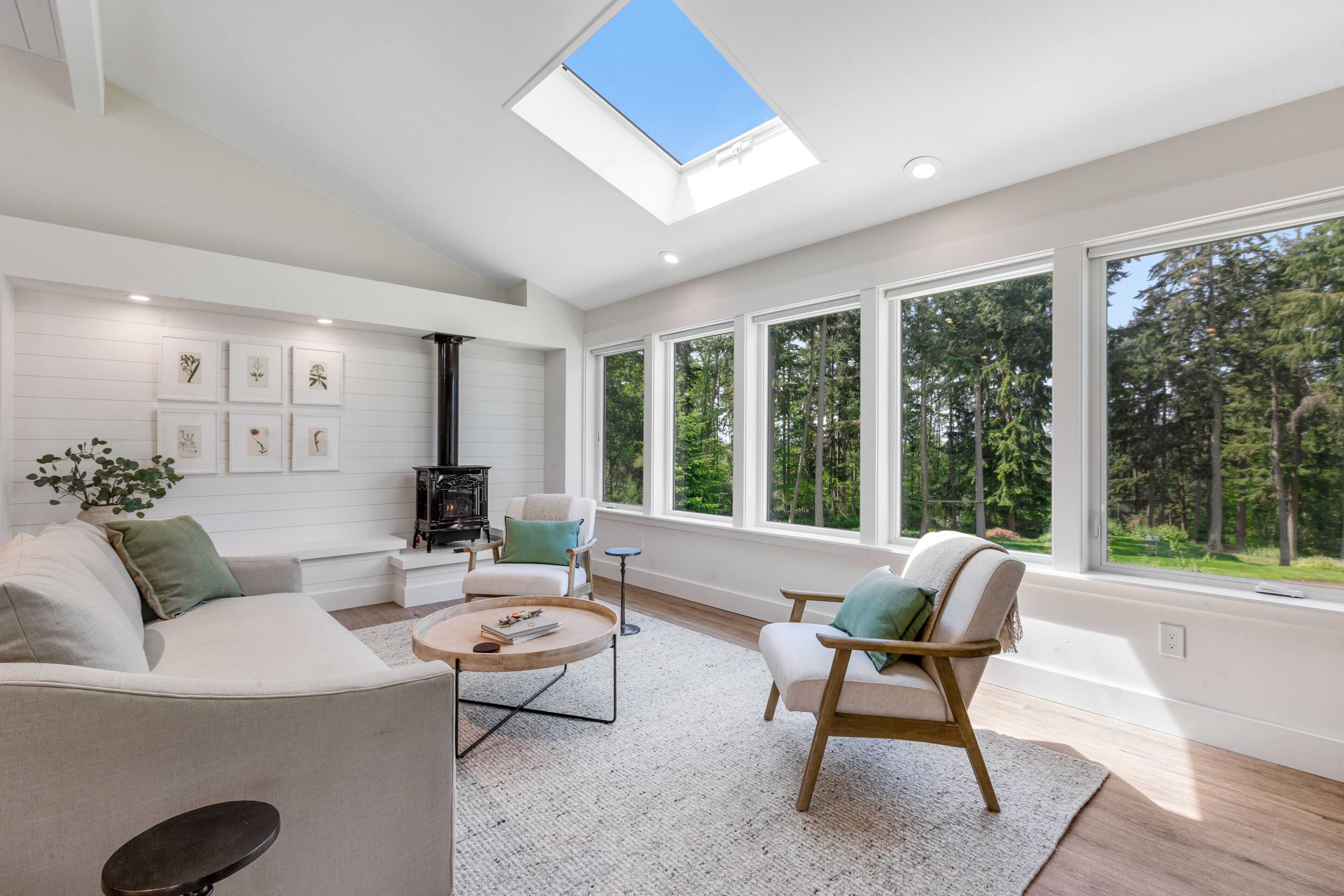 New construction - upper-level home with expansive deck & orchard views