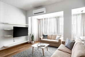 1 Bedroom Apartment Superiour (Bazel #47 St.) | Living area | 55-inch LCD TV with digital channels, TV, Netflix - BEN GURION BLVD - Classic Collection - By HOMY (Tel Aviv)