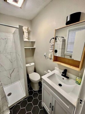 Hair dryer, towels, soap, shampoo