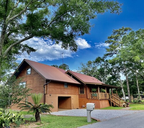 BEAUTIFUL WATERFRONT .  GNAT SCREENED BOATHOUSE AND AJOINING COVERED BOAT SLIPS

