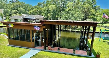 BEAUTIFUL WATERFRONT . GNAT SCREENED BOATHOUSE AND AJOINING COVERED BOAT SLIPS