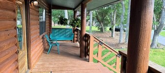 BEAUTIFUL WATERFRONT .  GNAT SCREENED BOATHOUSE AND AJOINING COVERED BOAT SLIPS
