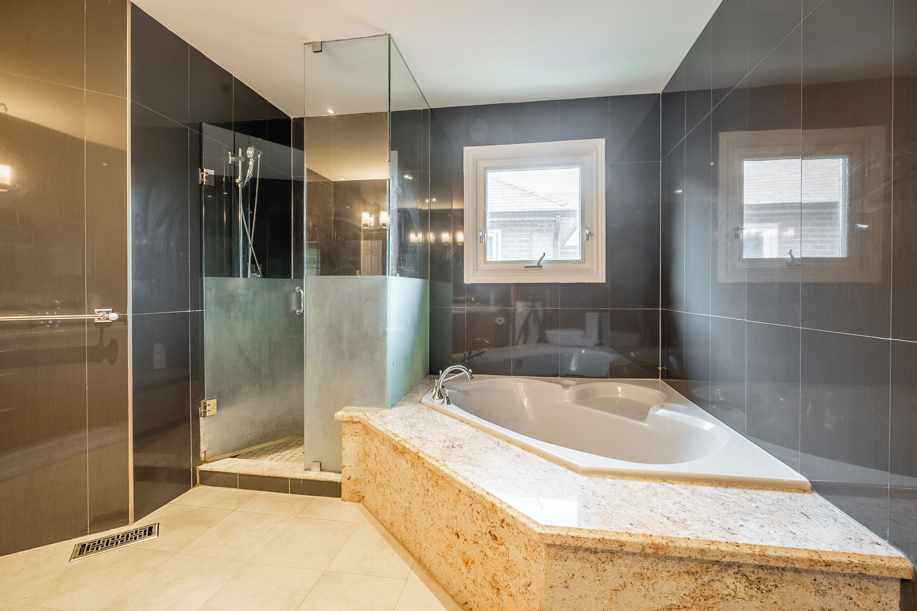 Shower, hair dryer, towels, toilet paper