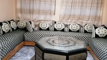Family Apartment | Living area | Flat-screen TV