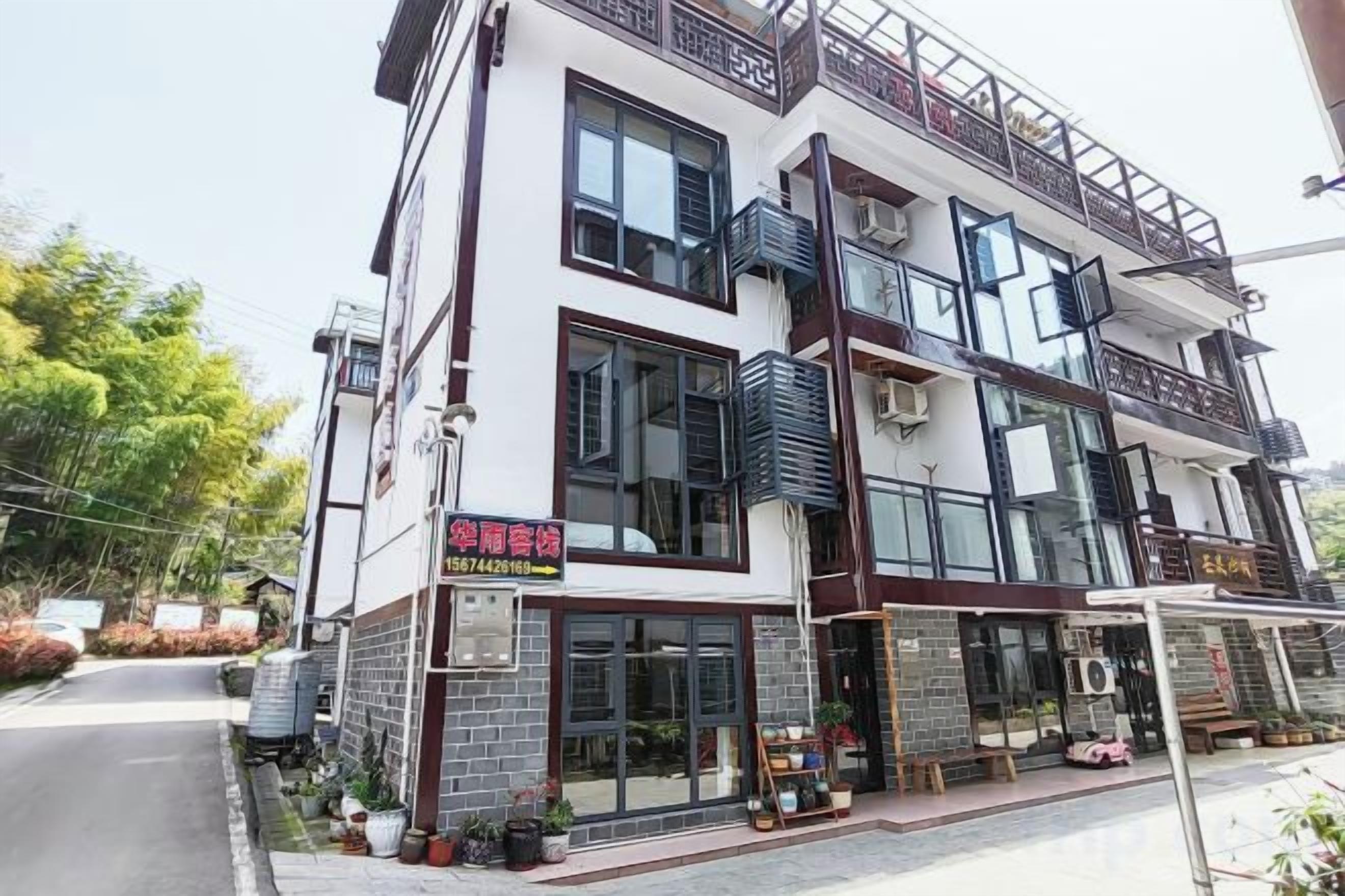 A multi-story building with a storefront on the ground floor.