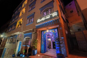 32-inch flat-screen TV with satellite channels, books