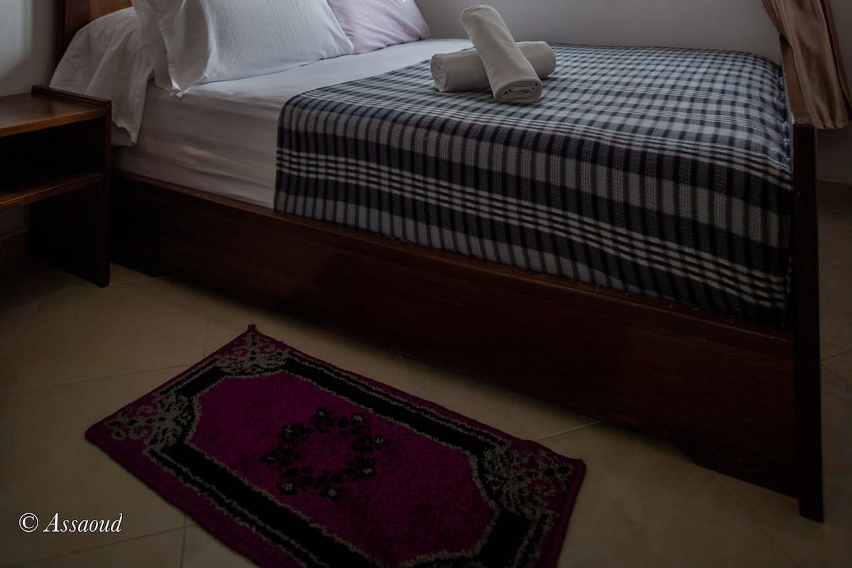 Family Room | Minibar, blackout drapes, free WiFi, bed sheets
