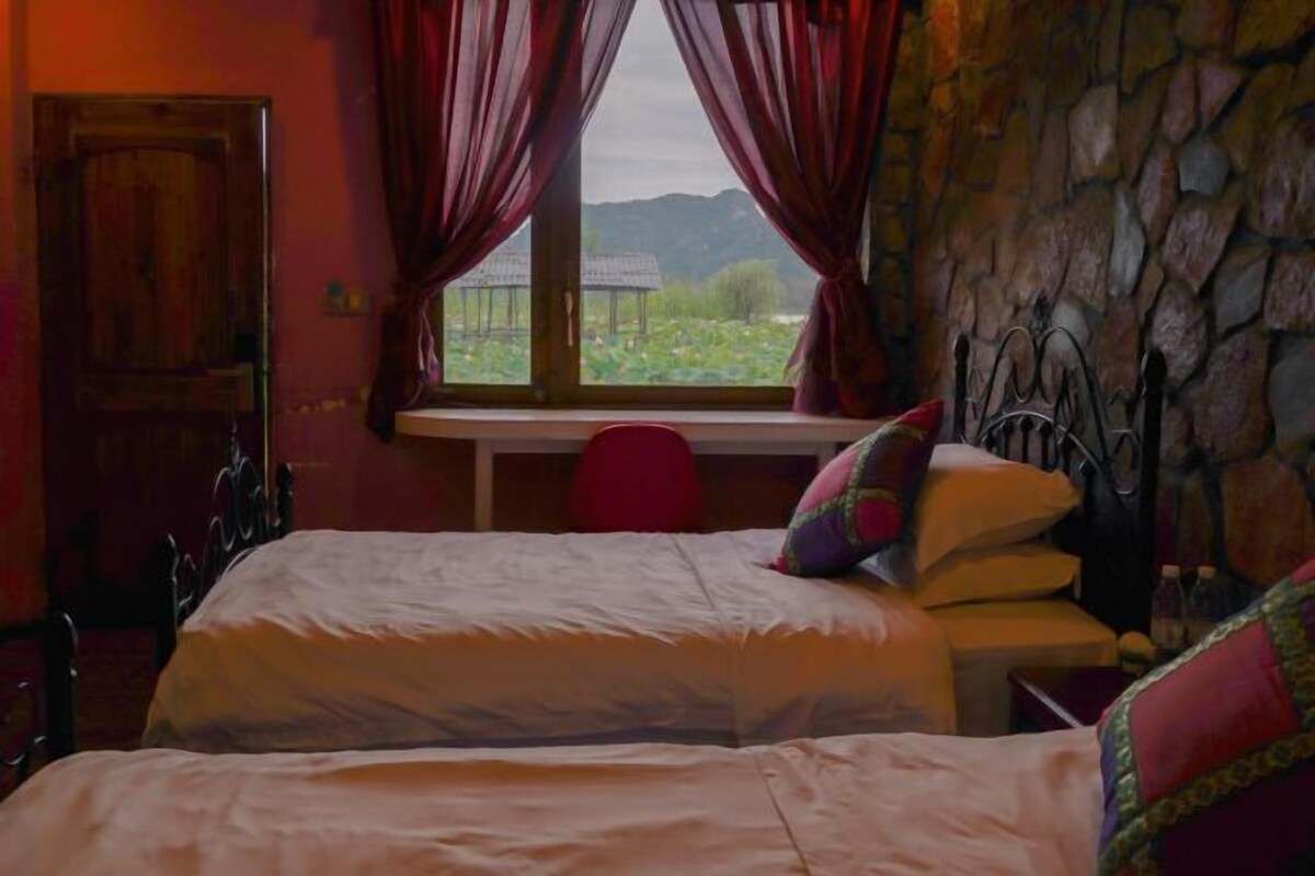 Down comforters, desk, blackout drapes, bed sheets