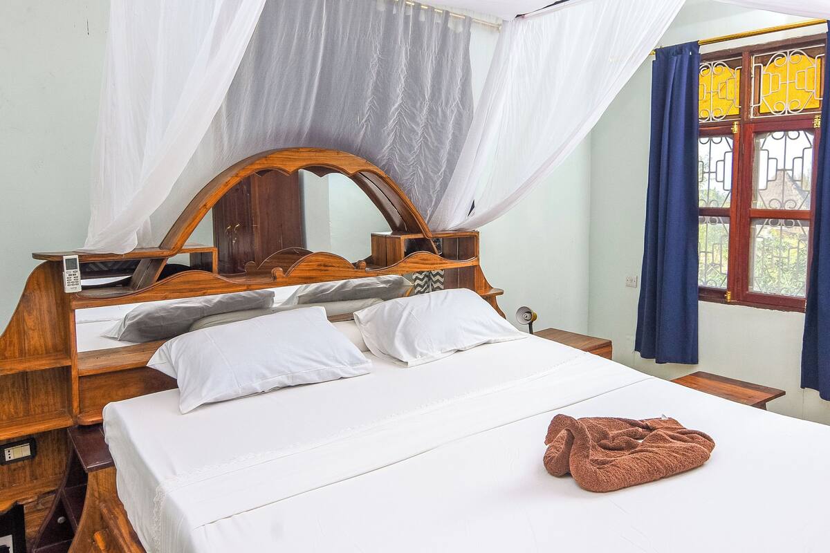 Two Bedroom Holiday Home with Balcony and Garden View | 1 bedroom, premium bedding, Select Comfort beds, in-room safe