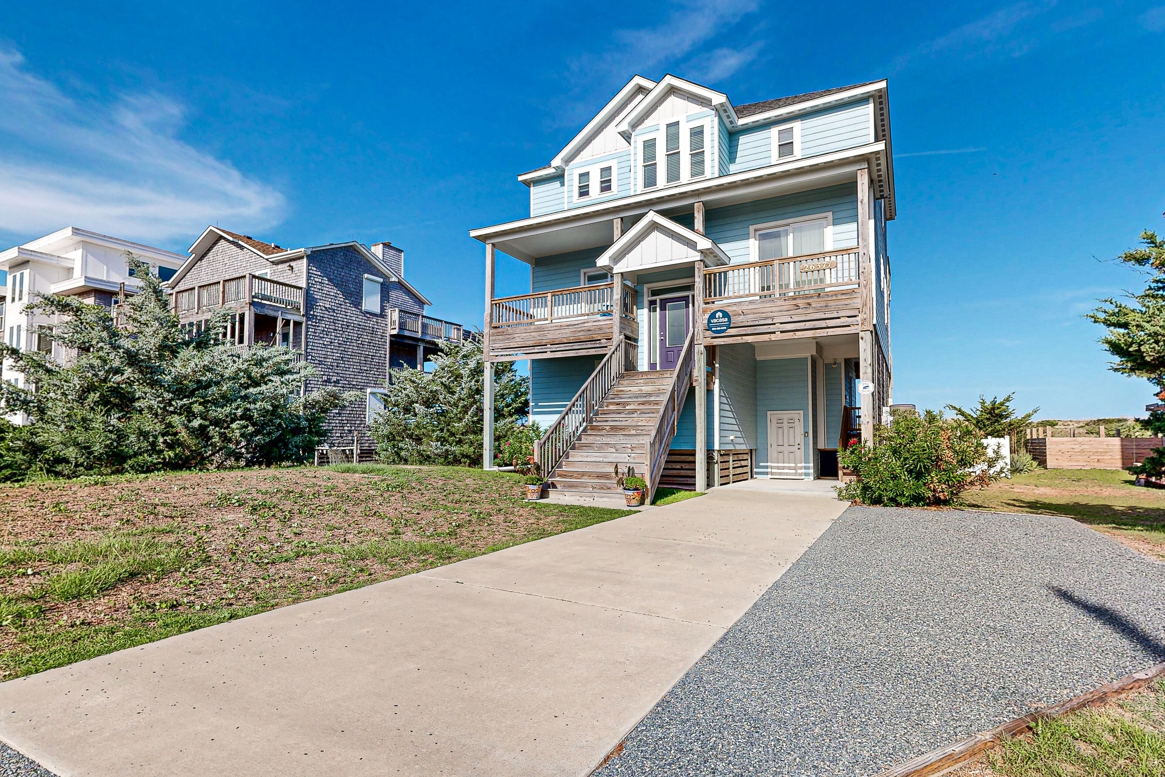 Waterfront home with pool, hot tub, balconies, fireplace, & AC - beach access