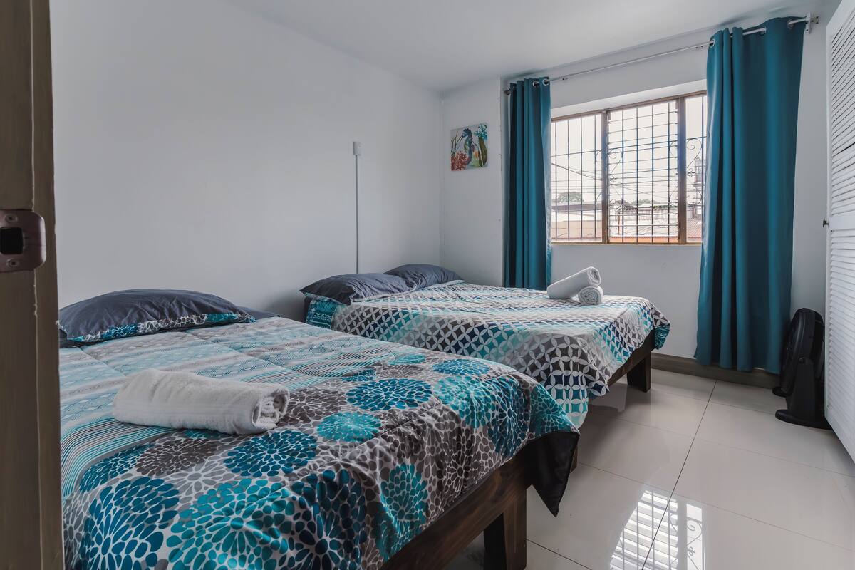 Basic Room | Premium bedding, down comforters, laptop workspace, blackout drapes