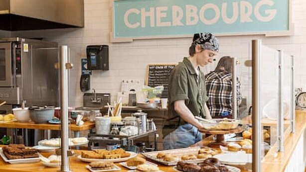 A breakfast counter with a variety of pastries and a sign that reads "CHERBOURG". - Walk to Rhinegeist | Findlay Market| Streetcar (Cincinnati)