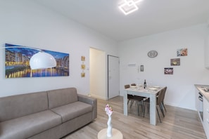 Basic Apartment, Multiple Beds | Living area