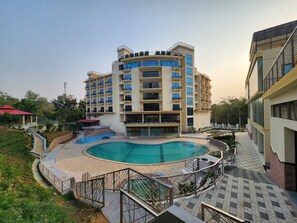 3 outdoor pools, open 9:00 AM to 9:00 PM, pool umbrellas, pool loungers - Paragon Hotel and Resort (Kamalganj)