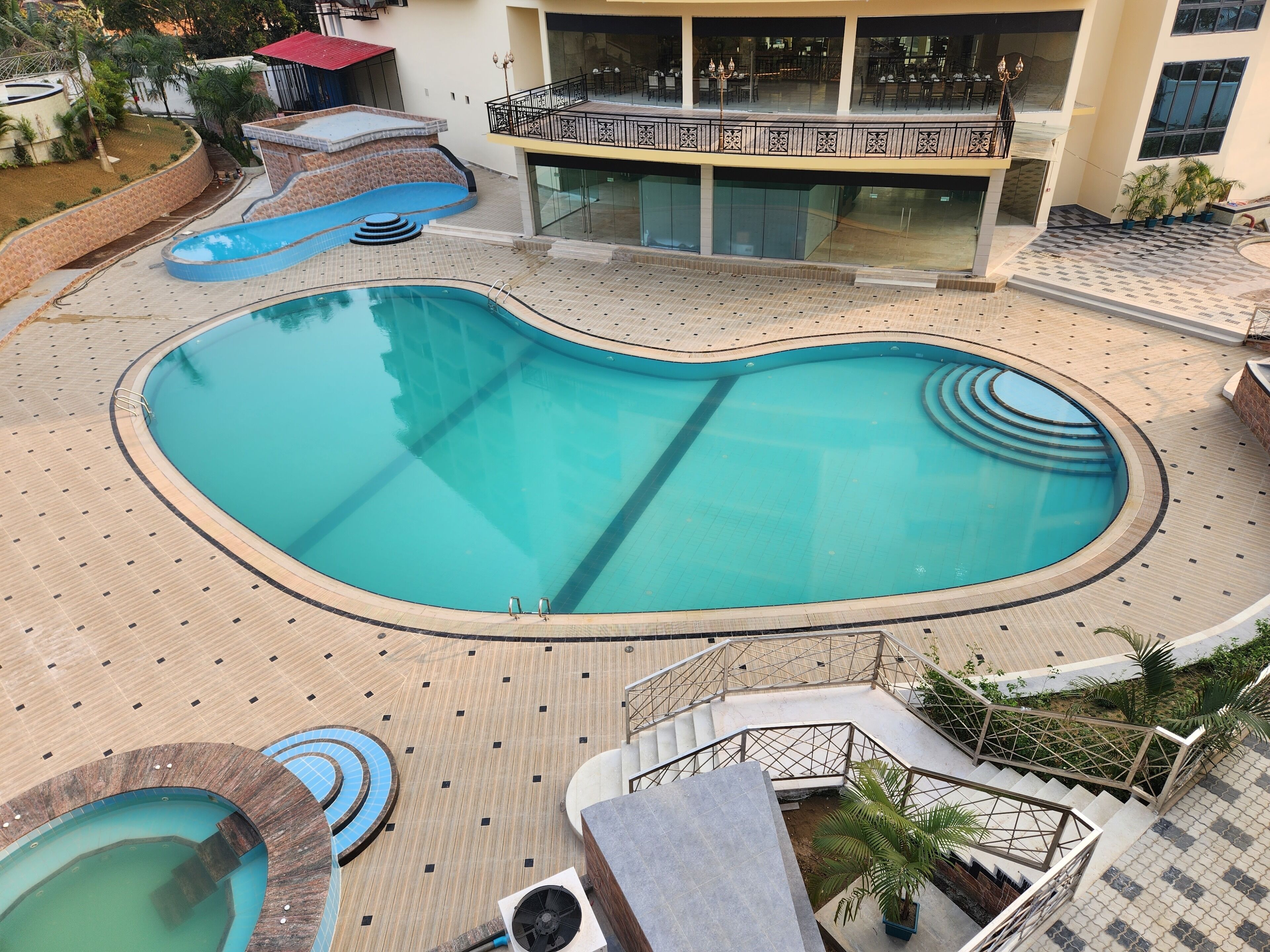 3 outdoor pools, open 9:00 AM to 9:00 PM, pool umbrellas, pool loungers