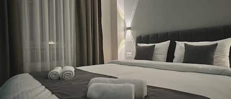 1 bedroom, hypo-allergenic bedding, desk, blackout curtains