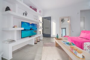 Family Apartment, Private Pool (First Floor) | Living area | 50-inch Smart TV with satellite channels, TV